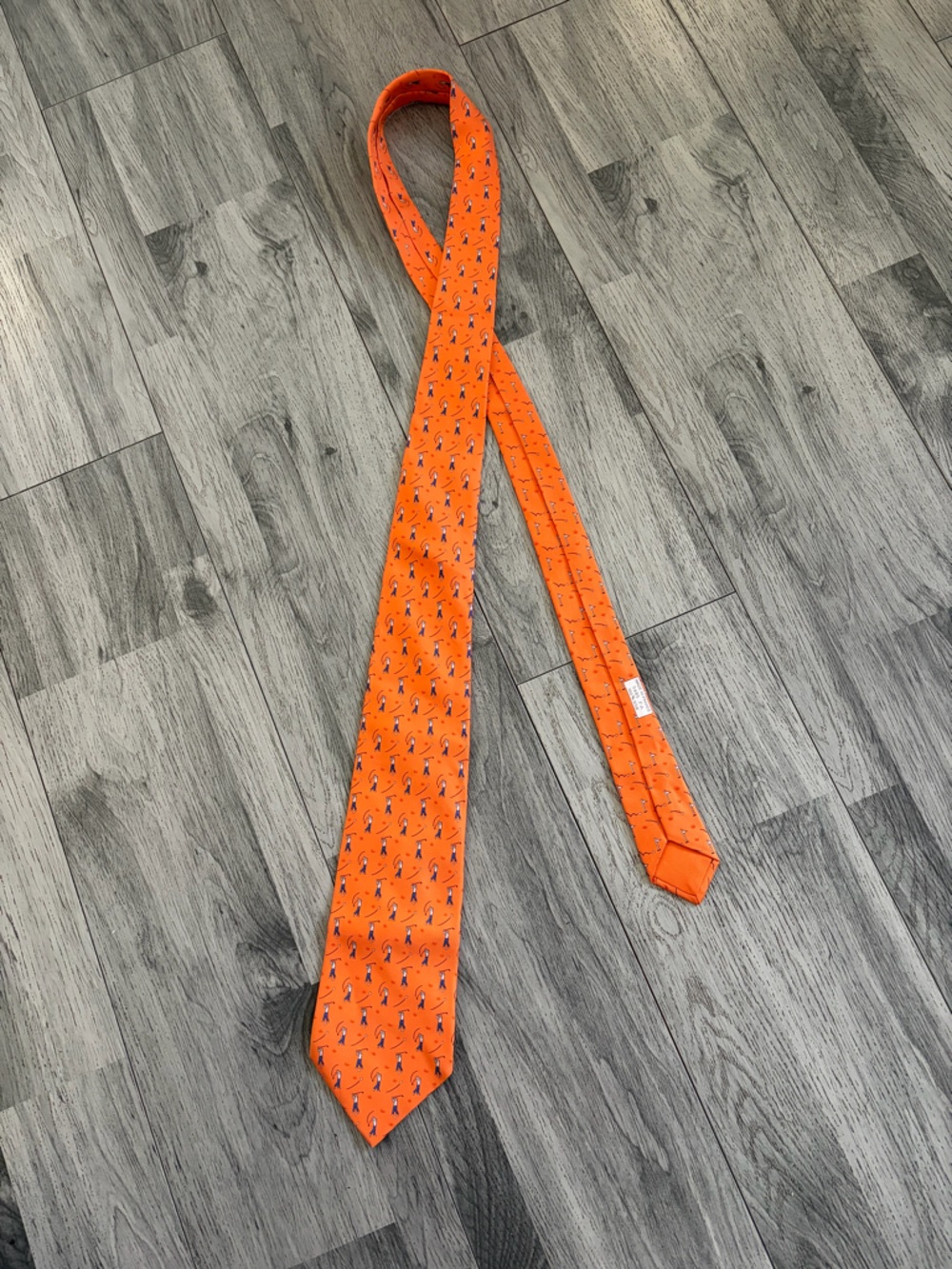 Hermes Orange Silk Tie with Small Navy & White Motif